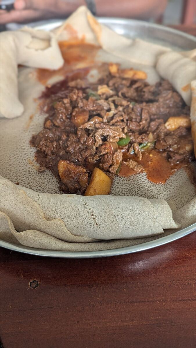 Tibs, sautéed meat