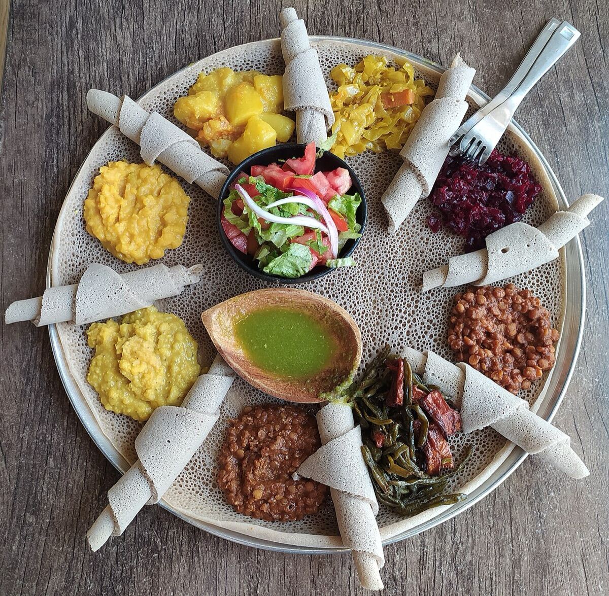 Injera with a spread of stews