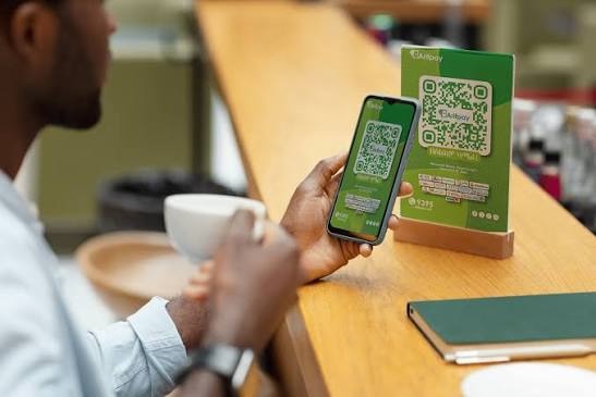 Scan the QR code to pay with mobile money